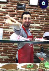 One of many unaccountably friendly people in Duzce. He was making Cig Kofte, which was amazing Turkish food